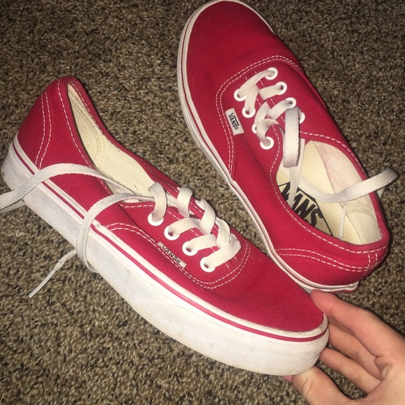 red vans on feet